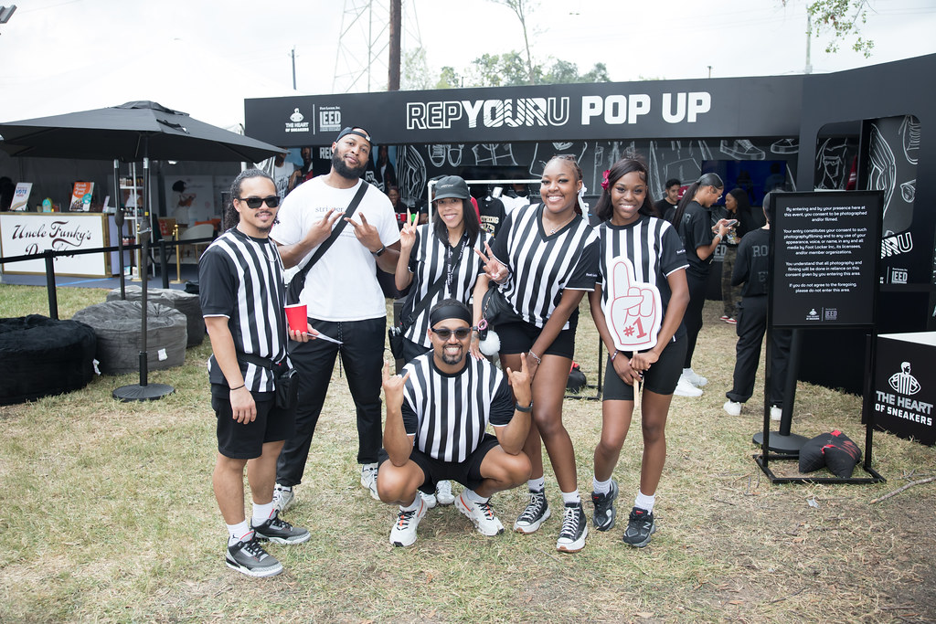 Footlocker Vendor with a group of staff at homecoming