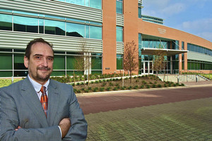 Doctor Vrinceanu standing in front of the Science and Technology Building.