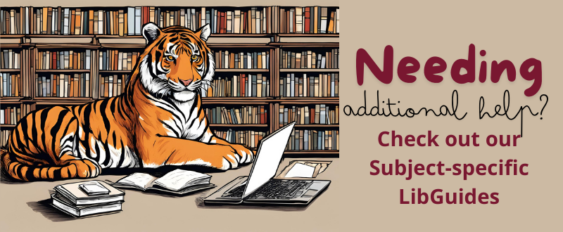 A tiger studying on a laptop with a stack of books and a bookcase in the background, emphasizing a focus on research and learning