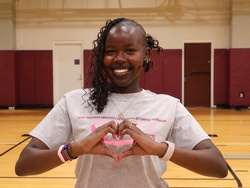 Image of Rec Staff with a heart hand gesture