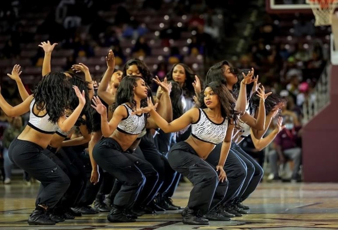 When the whole squad shows up in matching Senita Athletics. Catch the GCU  dance team in our Harmony Crop Top in Black & Studio Skin Jog